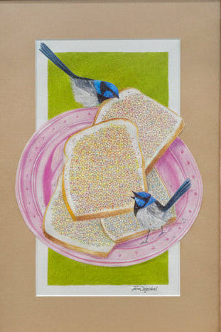 Framed artwork of bread slices with colourful sprinkles on a plate with birds, displayed on a wall.